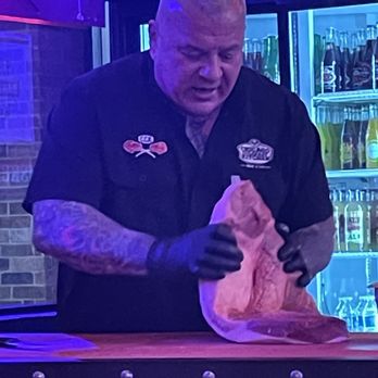 Chicago Culinary Kitchen - Co-owner Greg demonstrating how to make brisket. - Barbeque Near Me - Palatine, Illinois