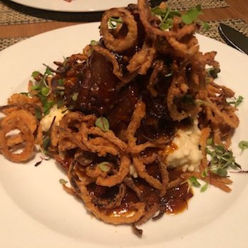 Truffles - The Special- Pork shank with cheese grits - American Near Me - St. Louis, Missouri