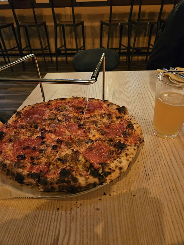 Trigo Wood Fired Pizza Logo
