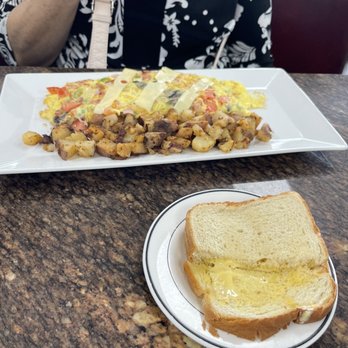 Chuck Wagon Restaurant - A pound of butter on the toast - Southern Near Me - Miami, Florida