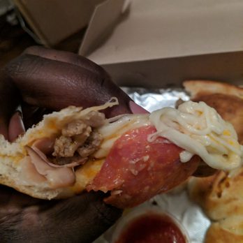Mr. Shoes Pizza - Inside of a meat lovers calzone - Pizza Near Me - Rochester, New York Mr. Shoes Pizza - Inside of a meat lovers calzone - Pizza Near Me - Rochester, New York