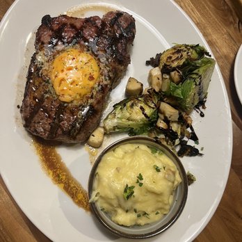 East End Grill - New York Strip Steak topped with Calabrian chili butter - New American Near Me - Lafayette, Indiana East End Grill - New York Strip Steak topped with Calabrian chili butter - New American Near Me - Lafayette, Indiana