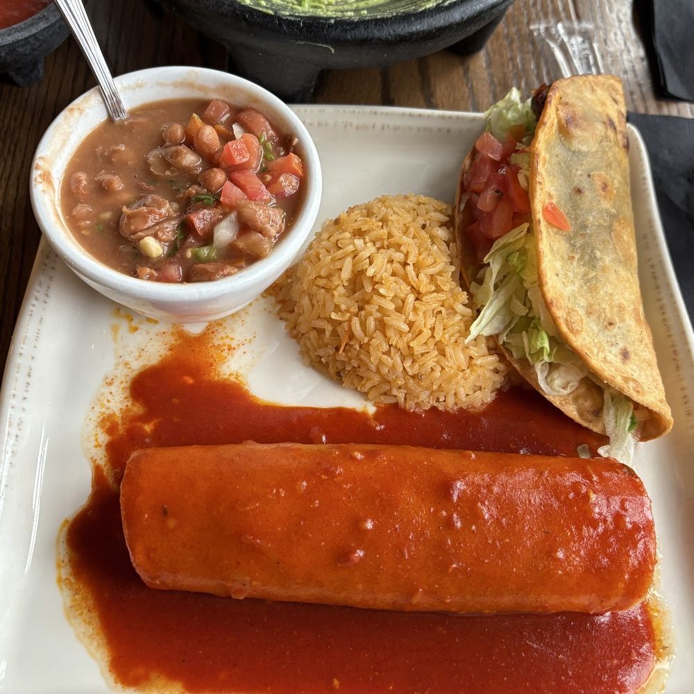 El Adobe - 2 choice combo..shredded beef crunchy taco, shredded beef (no cheese) enchilada. Charro beans. 10 out of 10 - Latin American Near Me - San Juan Capistrano, California El Adobe - 2 choice combo..shredded beef crunchy taco, shredded beef (no cheese) enchilada. Charro beans. 10 out of 10 - Latin American Near Me - San Juan Capistrano, California