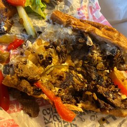 Burnt overcooked meat with barely any cheese and I ordered extra cheese. I was looking forward to a GOOD cheesesteak while I was in Philly.