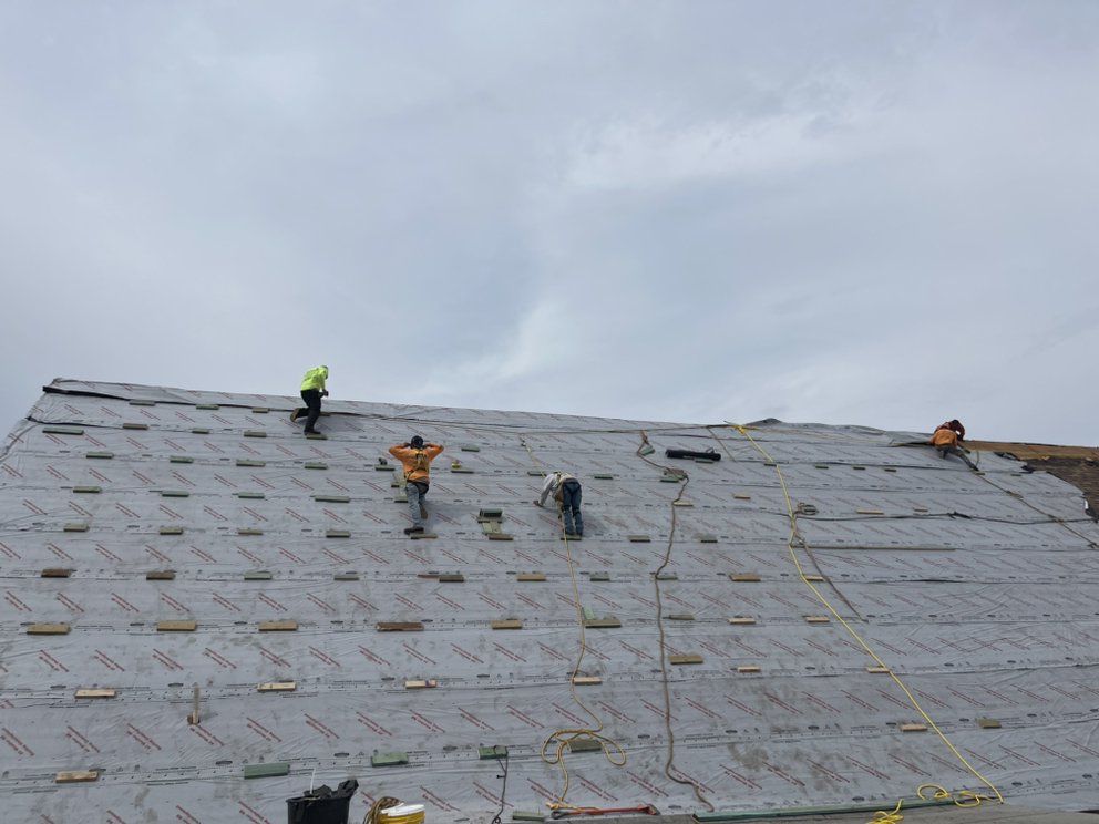 Slide of T & U Roofing