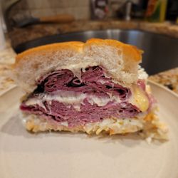 Meacham Deli - The Grandslam Pastrami, corn beef, melted Swiss, coleslaw, and Thousand Island dressing.