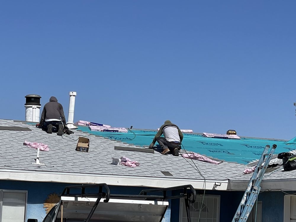 Slide of Elite Roofing