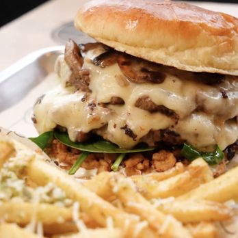 The Melt - Swiss and 'Shroom Meltburger with garlic parm fries - Sandwiches Near Me - Phoenix, Arizona The Melt - Swiss and 'Shroom Meltburger with garlic parm fries - Sandwiches Near Me - Phoenix, Arizona