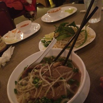 Pho 24 - p8 with pics of demolished spring rolls and fried egg rolls in the background - soup was not great though :( - Vietnamese Near Me - Sandy Springs, Georgia