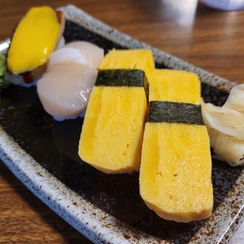 Kiraku Sushi - three pieces of sushi on a plate - Seafood Near Me - Richmond, British Columbia