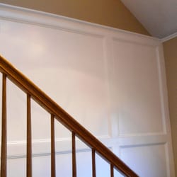 Chicago Rent A Painter - White semi gloss finish on wood panel and trim