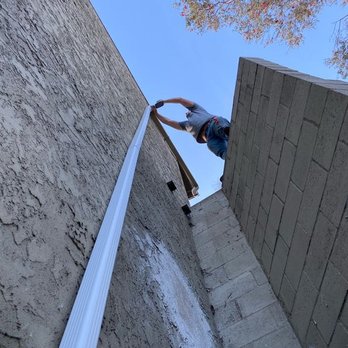 Gutter Guru - View of upper portion of the extension from the ground. - Gutter Services Near Me - Carlsbad, California Gutter Guru - View of upper portion of the extension from the ground. - Gutter Services Near Me - Carlsbad, California