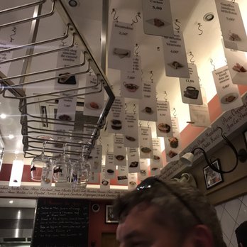 L'Avant Comptoir - Menu is conveniently hanging on the ceiling - Tapas Bars Near Me - Paris, 75