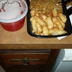 Sweet and sour chicken dinner combo plate.....super watered-down flavored sweet and sour sauce and breaded chicken was bleh...
