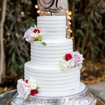 Bocakes - We added just a couple of flowers . The design on the frosting qas JUST as we requested. - Bakeries Near Me - Temecula, California
