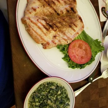 Laurenzo's Restaurant - Hardwood grilled chicken with a side of creamed spinach - Steakhouses Near Me - Houston, Texas Laurenzo's Restaurant - Hardwood grilled chicken with a side of creamed spinach - Steakhouses Near Me - Houston, Texas