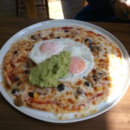 Eggs and avocado on cheesy tortilla...YUM!