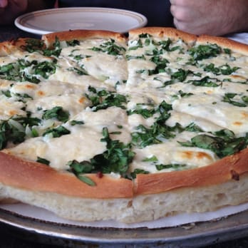 Athens Pizza - Spanakopizza: white pie with lots of cheese and some spinach. Delicious! - Pizza Near Me - Decatur, Georgia