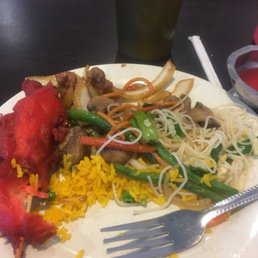 a plate of food and a drink