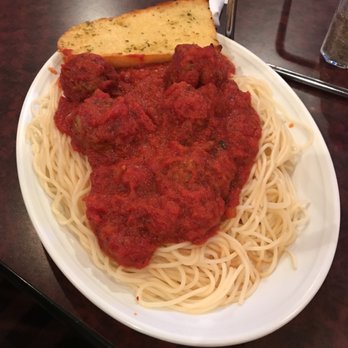 Village Pizza House - a plate of spaghetti and bread - Pizza Near Me - Castalia, Ohio Village Pizza House - a plate of spaghetti and bread - Pizza Near Me - Castalia, Ohio