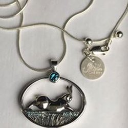 The Crystal Fish - Tim and Linda Cherry Fine Art Jewelry.