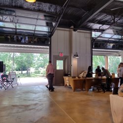 Statesboro Farmers Market - Inside the barn thing, Mr. Jamtastic got you covered with a big speaker blasting top 10 to prevent conversation throughout the market.