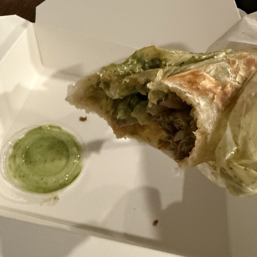 Khatta Pani - Lamb Kabob Roll - partially eaten - Indian Near Me - Bremen, Georgia