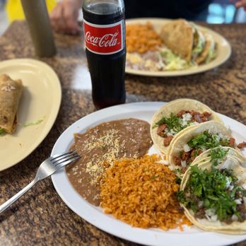 Chuck's Tacos - Three taco meal, one potato taco on the side and a Mexican Coke. - Tacos Near Me - Upland, California Chuck's Tacos - Three taco meal, one potato taco on the side and a Mexican Coke. - Tacos Near Me - Upland, California