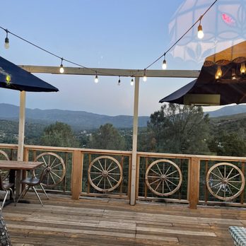 The Snow Line Saloon - Sunset patio view - Bars Near Me - Oakhurst, California The Snow Line Saloon - Sunset patio view - Bars Near Me - Oakhurst, California