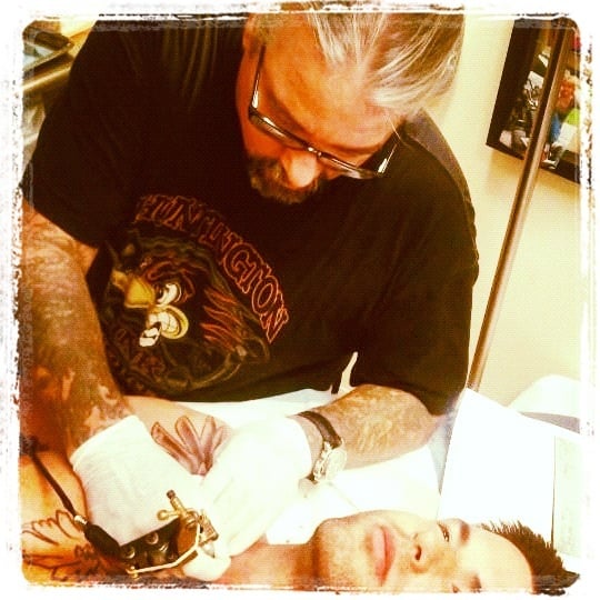 Marc's Tattooing Logo