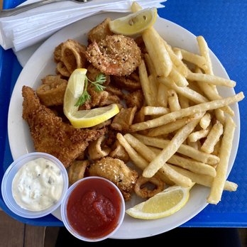Woodies Cafe - seafood combo (fried fish, fried shrimp, calamari and fries) - $18.50 - Seafood Near Me - Santa Cruz, California Woodies Cafe - seafood combo (fried fish, fried shrimp, calamari and fries) - $18.50 - Seafood Near Me - Santa Cruz, California