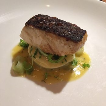 Persimmon - Mid-atlantic striped bass, fennel, creamy leek raviolo, shellfish butter sauce with lemon,, soooo goood! - New American Near Me - Providence, Rhode Island Persimmon - Mid-atlantic striped bass, fennel, creamy leek raviolo, shellfish butter sauce with lemon,, soooo goood! - New American Near Me - Providence, Rhode Island