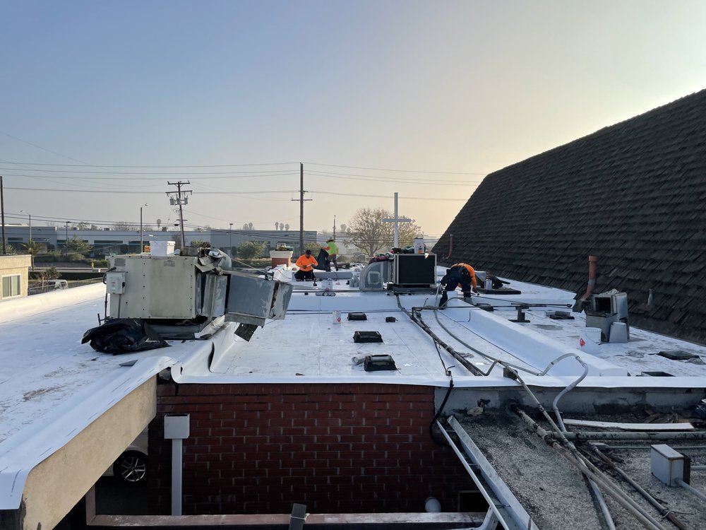 Slide of Virgen Roofing