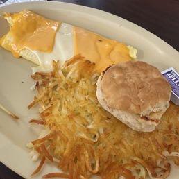 Cheese omelet with hash browns and biscuit