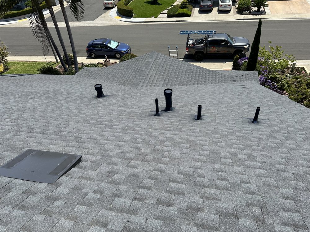 Slide of Rod's Roofing