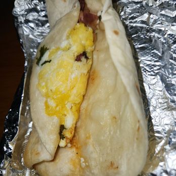 Founding Farmers Tysons - Breakfast tacos. Creamy eggs and crispy bacon on a flour tortilla with hot sauce. - New American Near Me - Tysons, Virginia Founding Farmers Tysons - Breakfast tacos. Creamy eggs and crispy bacon on a flour tortilla with hot sauce. - New American Near Me - Tysons, Virginia