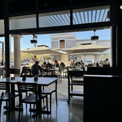 Culinary Gangster - Their front patio overlooking the parking lot!