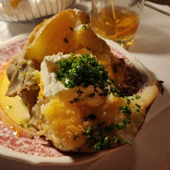 The Magic Lamp Inn - Giant baked potato, very good! - Steakhouses Near Me - Rancho Cucamonga, California