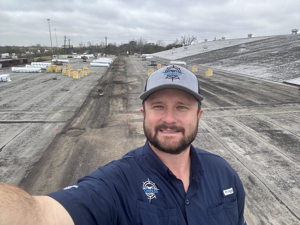 Slide of Compass Roofing