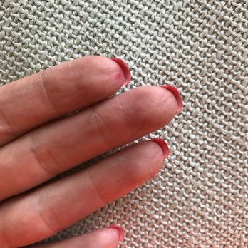 V-Stars Nails - Still red nail polish on my fingertips from my previous nail polish. The tops are rough and have been snagging my clothes. - Nail Salons Near Me - Minneapolis, Minnesota