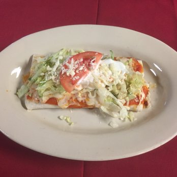 La Charrita - burritos deluxe  1 chicken & beans,1 beef and beans topped with lettuce sour cream guacamole Tomatoes and shredded chesse - Mexican Near Me - Findlay, Ohio