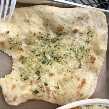 Tikka Shack Indian Grub - Garlic naan...so good I had to take bite - Indian Near Me - Mechanicsburg, Pennsylvania Tikka Shack Indian Grub - Garlic naan...so good I had to take bite - Indian Near Me - Mechanicsburg, Pennsylvania