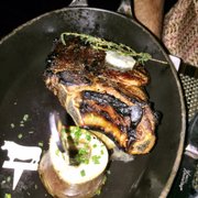 Photo of BLT Steak - Las Vegas, NV, United States. Bone-in ribeye with marrow and roasted garlic