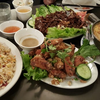 Phnom Penh - BBQ Fried Rice, Phnom Denh Deep Fried Chicken Wings, Filet Beef Luc Lau and Yellow Curry with Chicken - Cambodian Near Me - Vancouver, British Columbia Phnom Penh - BBQ Fried Rice, Phnom Denh Deep Fried Chicken Wings, Filet Beef Luc Lau and Yellow Curry with Chicken - Cambodian Near Me - Vancouver, British Columbia