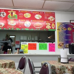 One Stop Food Store - Counter with a Mexican (top) and Colombian (right) menu