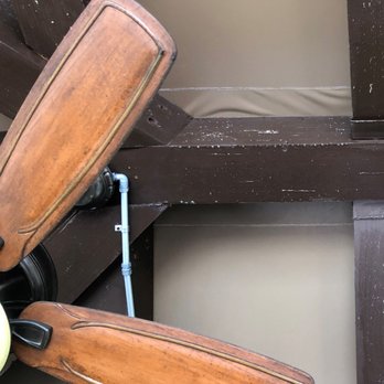 Moran Canvas Products - Water dripping along beams and into electric fan after failed Moran Canvas Products installation - Patio Coverings Near Me - La Mesa, California