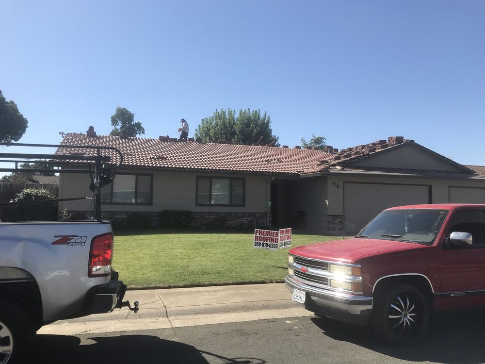 Slide of Premiere Roofing