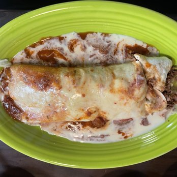 Sami's Place - #27 The Sancho basically a soy based meat filled burrito covered in a tasteless gravy and runny cheese. - Mexican Near Me - Decatur, Alabama