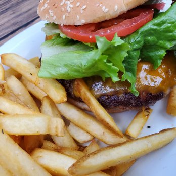 Caroline's - Rev. Joe's burger with bacon and cheddar cheese's the bomb! - American Near Me - Key West, Florida Caroline's - Rev. Joe's burger with bacon and cheddar cheese's the bomb! - American Near Me - Key West, Florida