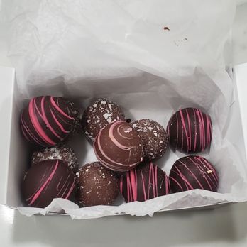 Chocolate Works - Dark & milk chocolate raspberry truffles and coconut chocolate truffles. ALL WERE AMAZING! - Chocolatiers & Shops Near Me - Red Bank, New Jersey